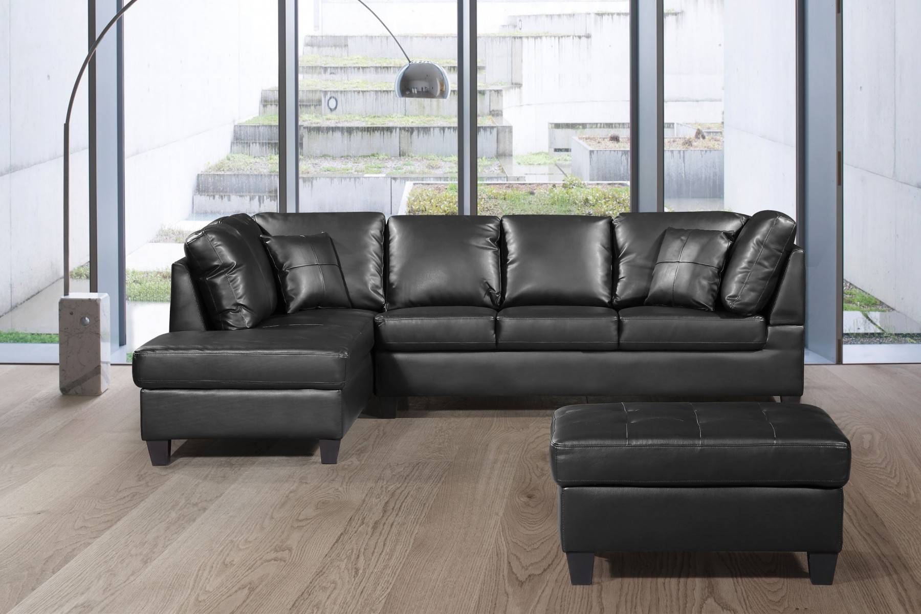 black bonded leather sectional sofa with single recliner